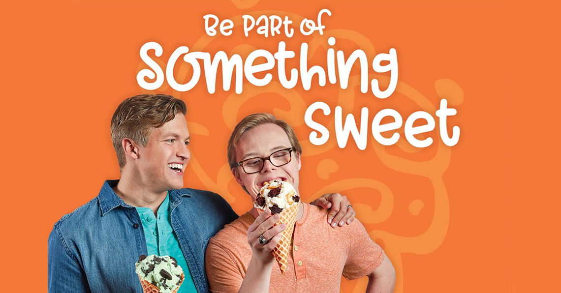 Cold Stone Creamery Lead Image Best Buddies Friendship participants since 2016, Stan and Drew eat ice cream cones as a part of a campaign partnership for Cold Stone Creamey and Best Buddies. The campaign slogan is, "Be Part of Something Sweet."