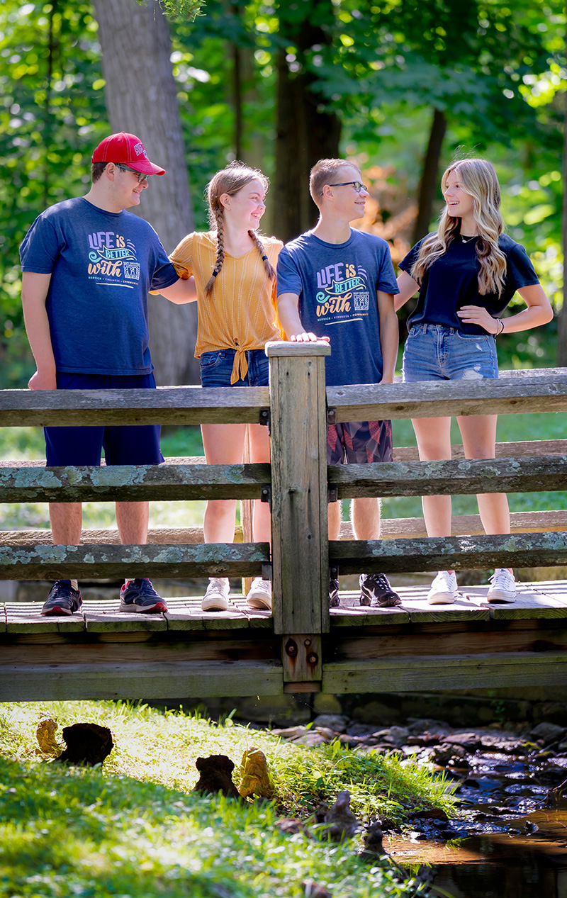 state-volunteer Best Buddies Volunteers standing back to back and smiling